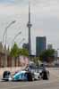 Paul Tracy in Action w/CN Tower in Background Thumbnail