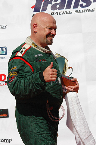 Paul Gentilozzi Giving Thumbs Up On Podium