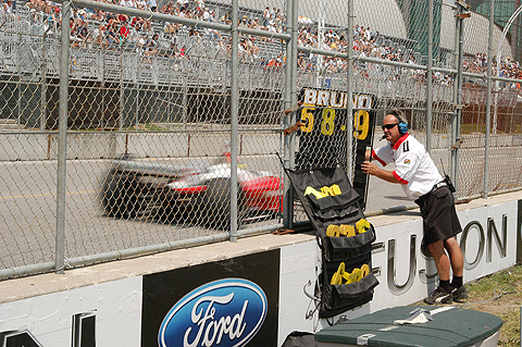 Bruno Junqueira Zooms By Pit Signal Board