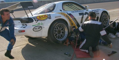 Mazda RX-7 Jacked Up in Pits