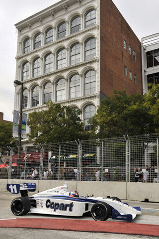 Josef Newgarden in Front of Building